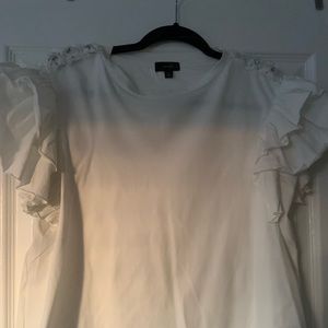 Shirt with design on shoulder